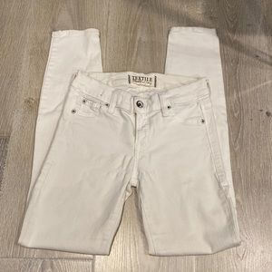Stretchy white skinny jeans
